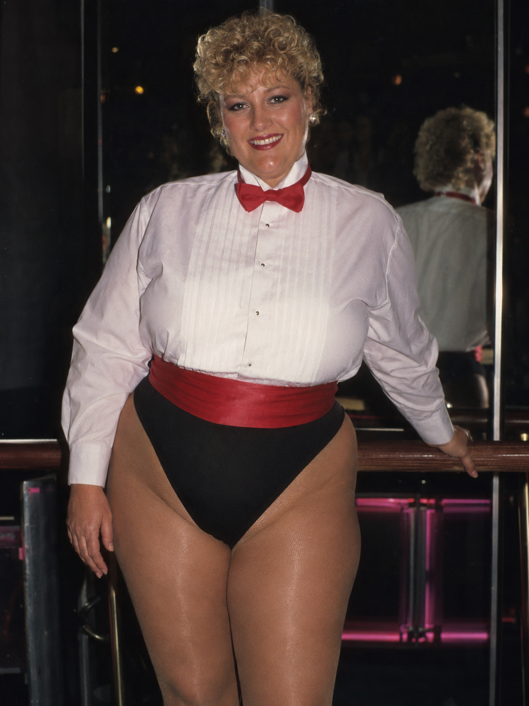 Photorealistic candid picture from 1987, Sweet beautiful middle-aged smiling tall obese body type with wide hips and ...