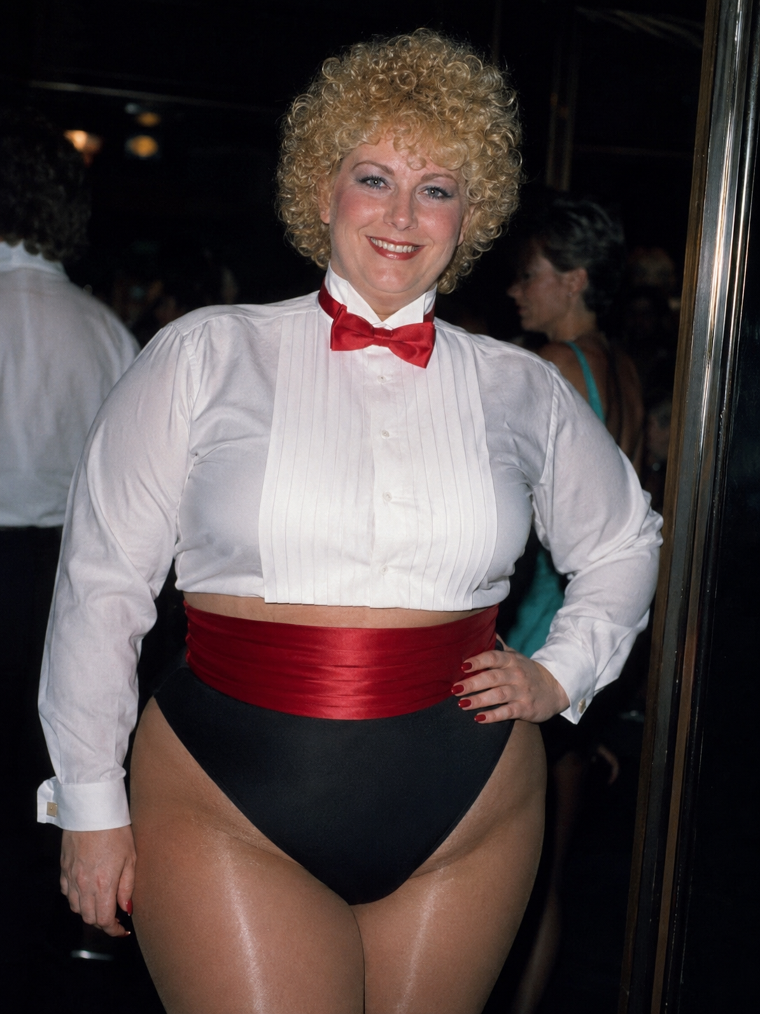 Photorealistic candid picture from 1984, Sweet beautiful middle-aged smiling tall obese body type with wide hips and ...