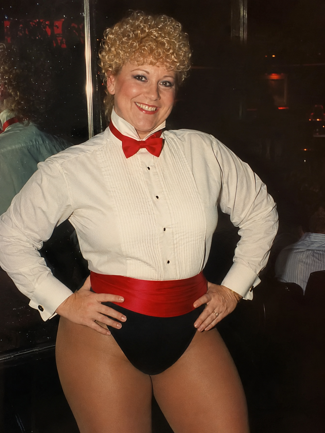 Photorealistic candid picture from 1985, Sweet beautiful middle-aged smiling tall portly obese body type with wide hi...