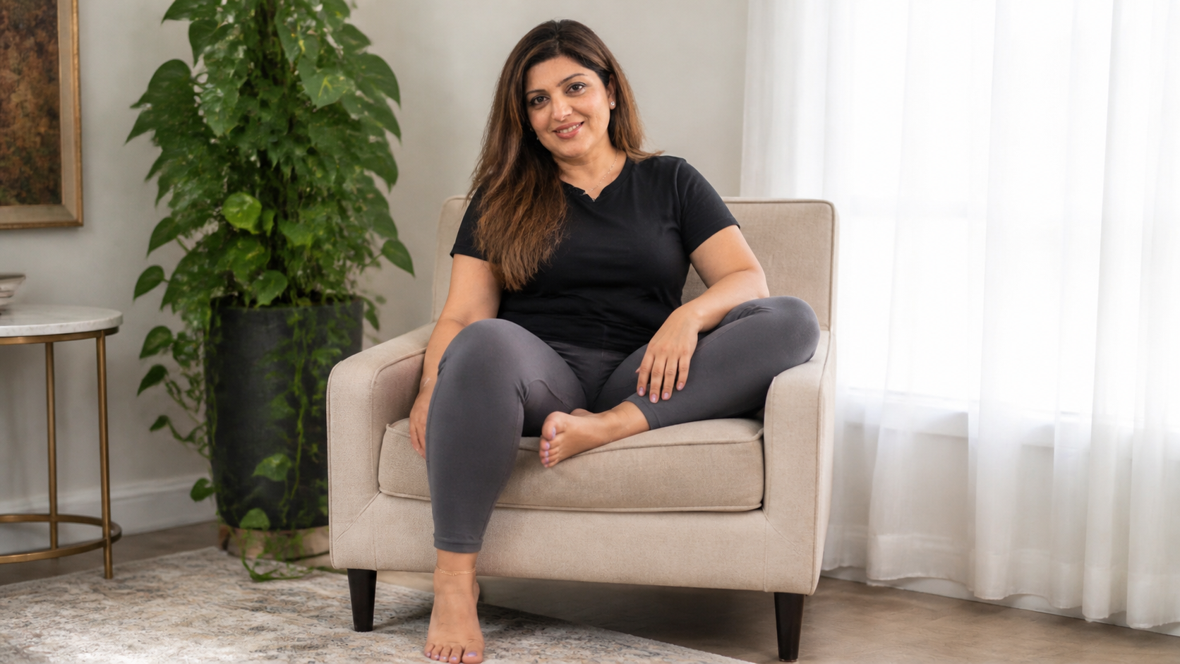 gpt-image-2 render: Photorealistic Daylit Portrait Of Seated South Asian Woman Barefoot